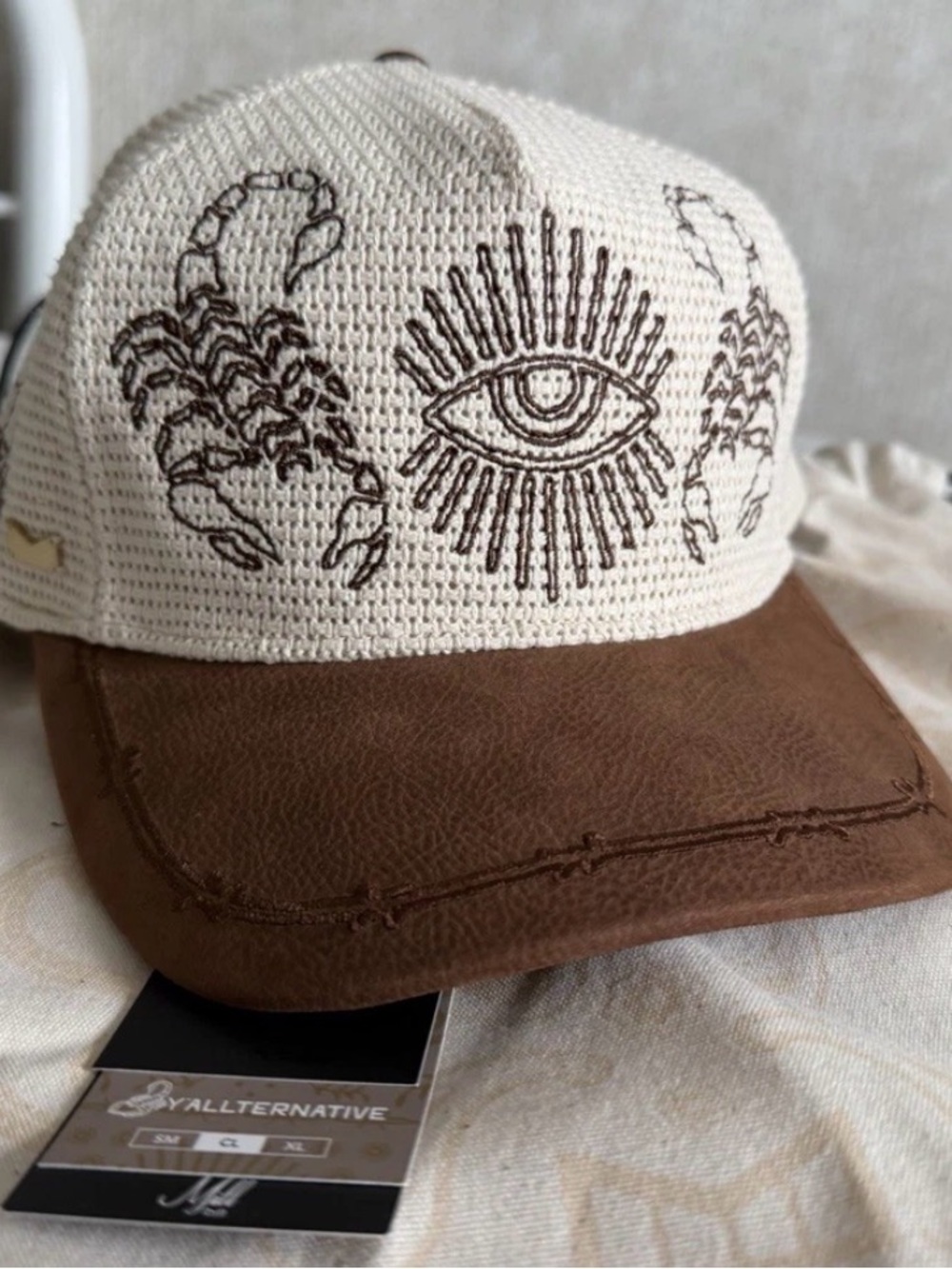Melin Brand Tan & Brown Eye Embroidered Trucker Hat - Picture 2 of 6